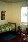 one of 3 twin bedrooms